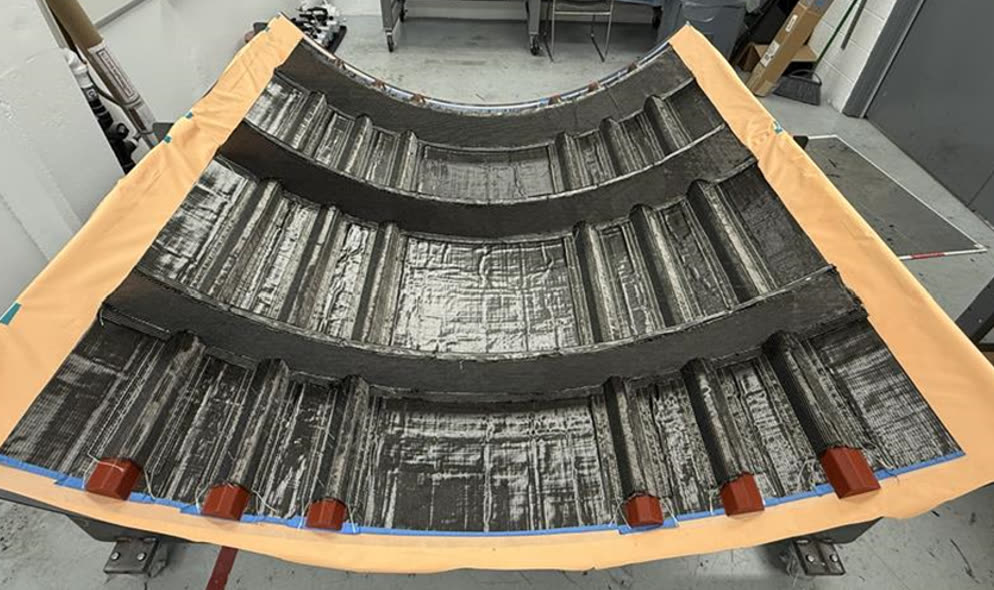 Stitched preform of an integrally-stiffened composite fuselage panel, ready for resin infusion